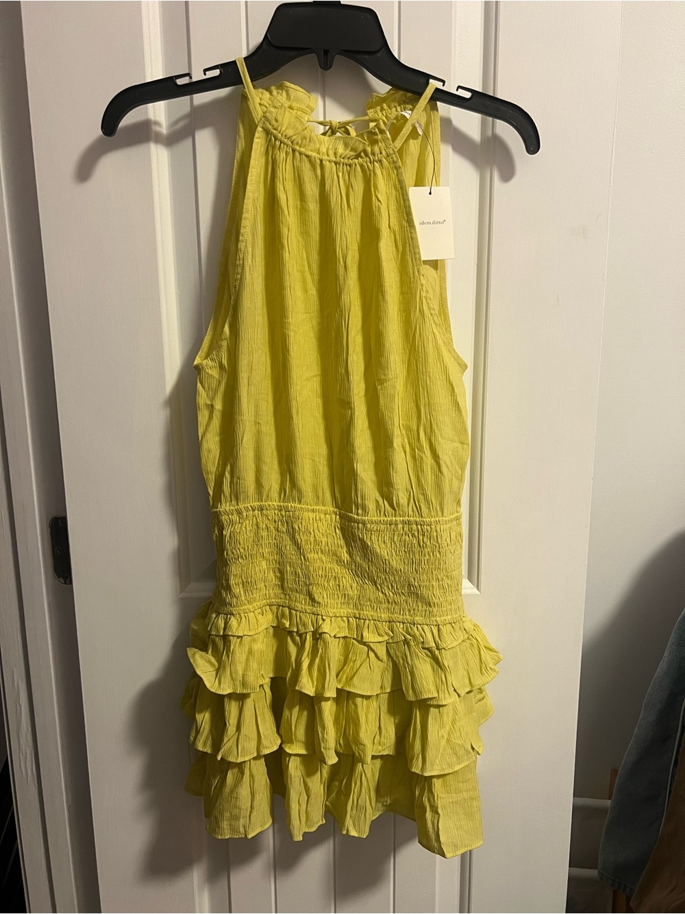 Sleeveless Ruffle Hem Romper in Lemon Yellow